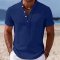 Detail of men's navy blue cotton linen shirt with stand collar and white buttons - Navy Blue