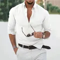 Close-up detail of a white cotton linen long-sleeved shirt for men in casual style - S / Tops / White