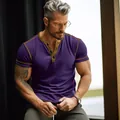 Close-up of men's slim fit purple Henley T-shirt with contrast gold trim detailing - Purple