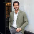 Macro detail of a men's sage green linen blazer in a casual business style outdoors - S / Tops / Light Green