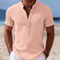 Close-up of men's salmon cotton linen shirt with mandarin collar in beach setting - S / Tops / Pink