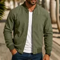 Detailed view of a premium olive green suede bomber jacket with front zipper and ribbed cuffs - S / Tops / Army Green