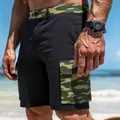 Detail of men's black cargo shorts with camouflage pockets at the beach. - Black Green Camo
