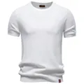 High-quality detail view of a white men's casual crew neck knitted T-shirt with textured fabric - S / Tops / White