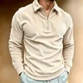 Detail of men's beige corduroy polo shirt with a silver half-zip and ribbed cuffs. - S / Tops / Apricot