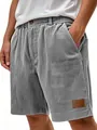 Vue détaillée d'un short cargo en velours côtelé gris pour homme avec patch rétro stylé - S / Bas / Gris