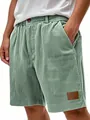 Détail de la texture d'un short décontracté en velours côtelé vintage pour hommes - S / Bas / Vert clair