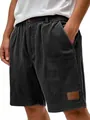 Détail du short en velours côtelé gris foncé pour homme montrant la texture du tissu - S / Bas / Noir