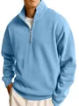 High-quality detail of a men's light blue half-zip sweatshirt with a mock neck. - Light Blue
