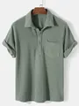 Detailed view of olive green waffle knit corduroy men's shirt with front pocket - S / Top And Bottom / Green