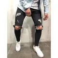 Close-up showing distressed knee details on men's slim fit black ripped denim jeans - S / Bottoms / Black