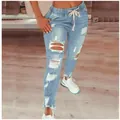 Women's high waist ripped denim jeans with elastic drawstring waist in light blue. - Light Blue