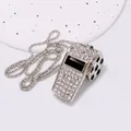 Detailed view of silver-toned rhinestone studded whistle with soccer ball motif - Football Whistle Necklace / Silver