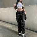High-waist black multi-pocket cargo denim pants for women with street style flair - XS / Bottoms / Black