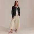 Women's off-white wide-leg cropped jeans with ruffled hem detail. - S / Bottoms / Off White