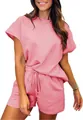 Close-up of pink textured loungewear set featuring short sleeve top and matching shorts - S / Top And Bottom / Pink