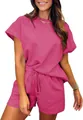 High-definition detail of a vibrant pink textured fabric two-piece short set on a model - S / Top And Bottom / Rose Red