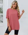 Close-up detail showing the loose fit and side slit design of this dusty rose T-shirt - Rouge Red