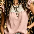 Close-up of pink cotton linen blouse with white lace patchwork and ruffle sleeves - S / Tops / Pink