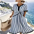 Elegant blue and white vertical striped V-neck midi dress with waist twist detail - S / Dresses / Striped