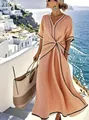 Side view of elegant apricot V-neck maxi dress with black piping and twist front detail - S / Dresses / Orange Pink