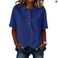 Detail view of the asymmetrical button-down design on a navy blue casual women's shirt - Dark Blue