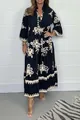 Vue détaillée d'une robe longue noire élégante à manches longues et motifs beiges - S / Robes / Noir