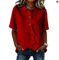 Detailed view of red casual short sleeve shirt with unique irregular asymmetric hemline. - Red