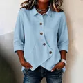Light blue 3/4 sleeve shirt for women with unique irregular hem and wooden buttons - S / Tops / Light Blue