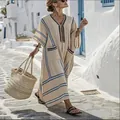 Elegant oversized V-neck maxi dress with navy stripes and pocket detail. - S / Dresses / Apricot Striped