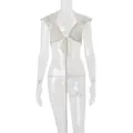 Detailed front view of white crochet lace tie-front top with shell decorations on mannequin - S / Tops / Apricot