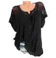 Close-up detail of black V-neck lace embroidered short sleeve batwing blouse for women - S / Tops / Black