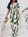 Elegant V-neck batwing sleeve jumpsuit with green and white abstract print detail - S / Green