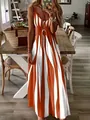 Elegant sleeveless V-neck maxi dress with orange and white striped print in a home setting - S / Dresses / Orange Red
