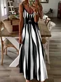 Detailed view of casual black and white V-neck striped maxi dress for women - S / Dresses / Black