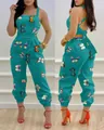 Detail of women's turquoise butterfly print halter backless high waist jumpsuit. - Butterfly Print