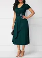 Elegant dark green V-neck dress with rhinestone buckle and flared asymmetrical hem - Green