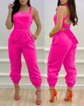 Front and back view of fuchsia backless high-waist jumpsuit with a decorative bow tie - S / Jumpsuits / Rose Red