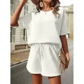 Completo due pezzi in maglia a nido d'ape bianco con top a pipistrello e pantaloncini - Taglia S / Top E Pantaloni / Bianco