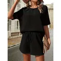 Completo casual a due pezzi in maglia a nido d'ape nera con maglia a maniche corte e shorts - Taglia S / Top E Pantaloni / Nero