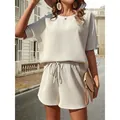 Completo due pezzi in maglia waffle bianco avorio con maglia a pipistrello e pantaloncini - Taglia S / Top E Pantaloni / Bianco avorio