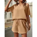 Completo due pezzi da donna in maglia a nido d'ape con maniche a pipistrello e pantaloncini. - Kaki