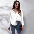 Elegant white satin long-sleeved shirt with button-down collar and smooth texture details - S / Tops / White