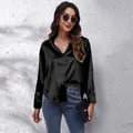 Elegant black satin long-sleeve shirt for women, formal work style with smooth silk texture. - S / Tops / Black