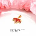 Macro detail of copper maple leaf pendant with red zircon and technical specifications - Orange Red Pendant Only / Gold