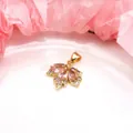 Close-up of a gold-plated maple leaf pendant with pink and lavender zircons - Pink Pendant Only / Gold
