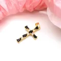 Detailed macro view of a gold-plated cross pendant with black and clear cubic zirconia - Pendant Only (Without Chain) / Black
