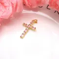 Close-up of a gold-plated cross pendant with pink marquise zircons on a white plate - Pendant Only (Without Chain) / Pink