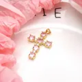 Detailed macro shot showing a gold-plated copper cross pendant with pink zircons - Pendant Only (Without Chain) / Pink