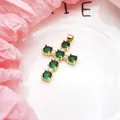 Detailed close-up of a gold-plated cross pendant set with vibrant green zircons - Pendant Only (Without Chain) / Green